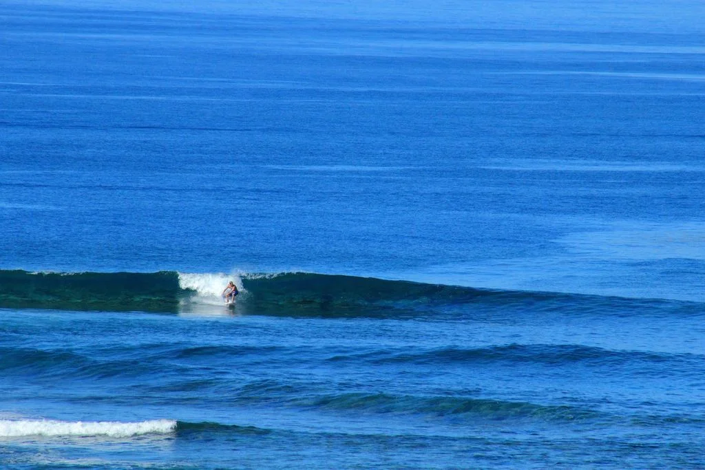 Early morning surfing at Macondé